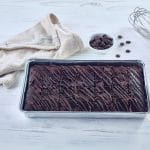 Vegan dark chocolate brownie in a tray