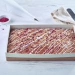 Lemon and raspberry cake in a tray
