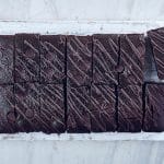 Vegan Dark Chocolate Brownie, sliced into 14 portions and viewed from above.