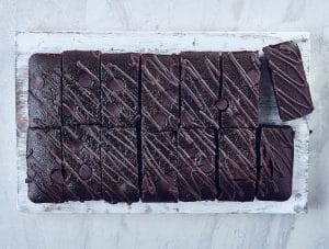 Vegan Dark Chocolate Brownie, sliced into 14 portions and viewed from above.
