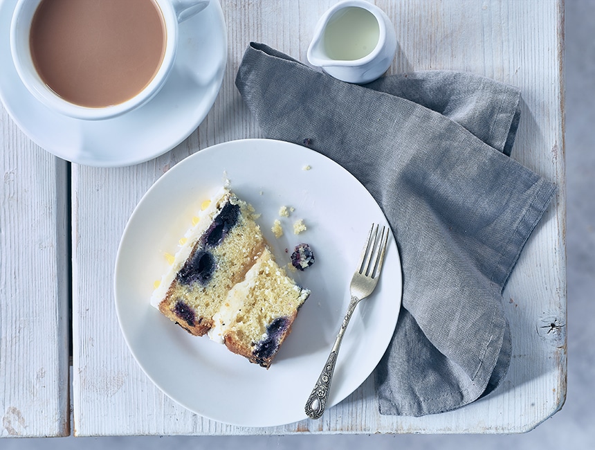 Slice of Lemon and blueberry cake on a plate
